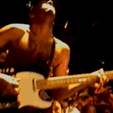 headbang tom morello rage against the machine killing in the name playing the guitar