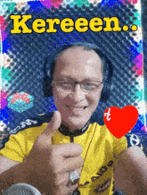 a man wearing headphones and giving a thumbs up with the word kereeen written above him