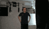 a man is standing in front of a wall with a sign that says ' vpecht ' on it