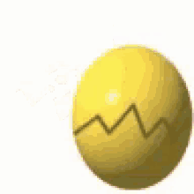 a baby is coming out of a cracked egg .