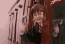 Harry Potter Wave GIF - Harry Potter Wave Bye GIFs