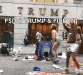 a woman in a bikini is dancing in front of a building that says trump