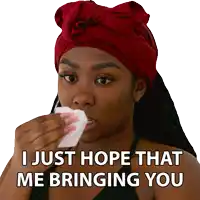 a woman wearing a red head scarf wipes her nose with a napkin and says i just hope that me bringing you