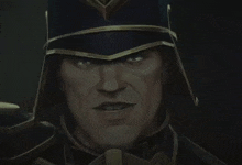 a close up of a man wearing a helmet and armor