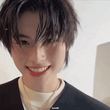 a close up of a person 's face with the words aaa + gif on the bottom right