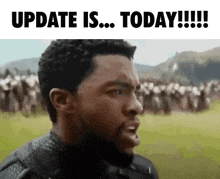 a man is making a funny face in front of a crowd of people and the words `` update is today '' .