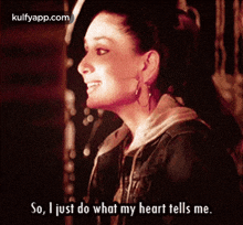 a woman is smiling and says " so i just do what my heart tells me "