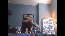 a sonic the hedgehog video game is on a bed