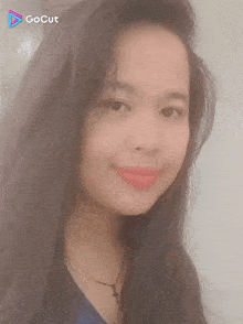a picture of a girl with a gocut watermark