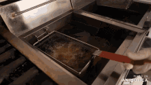a fryer with the words made in animatica on the bottom of it