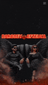 a man and a woman are sitting next to each other with the words barobey eptelya in red