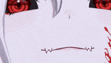 a close up of a person 's face with blood coming out of their mouth