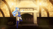 aqua is dancing in front of a fireplace in a room