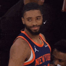a man in a new york jersey with the number 5