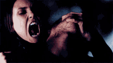 Katherine Pierce Feeding Off A Man Biting Down GIF