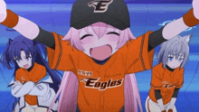 a girl wearing a baseball uniform that says eagles on it