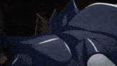 a blonde anime girl with horns is looking at the camera .