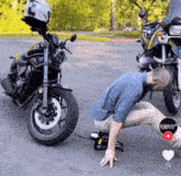 a man is kneeling down next to a motorcycle with a pumpify logo in the corner