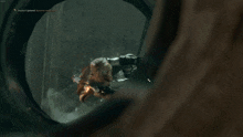 a screenshot of a video game shows a man and woman fighting