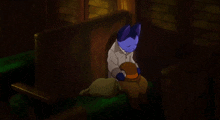 a blue cat sits on a bench holding a bag