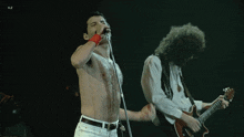 Freddie Mercury Brian May GIF - Freddie Mercury Brian May Queen GIFs