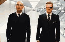 Colin Firth Mark Strong GIF