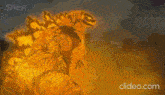 a cartoon drawing of a monster with a flame coming out of it 's mouth .