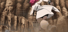 a woman in a white dress jumps in the air