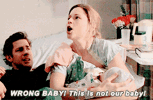 The Office Wrong Baby GIF - The Office Wrong Baby This Is Not Our Baby GIFs