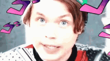 a close up of a person 's face with a hat on