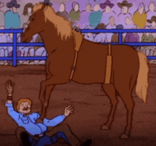 a cartoon of a man falling on the ground next to a horse