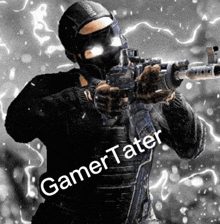a man in a mask is holding a gun with the words gamer tater below him