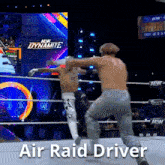 two men are wrestling in a ring with the words air raid driver written on the bottom