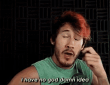 a man with red hair and a beard is wearing a green tank top and says `` i have no god damn idea '' .