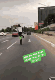 a person riding a motorcycle on a highway with a caption that says how do you even learn how to do this !