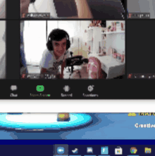 a computer screen shows a girl wearing headphones and a green button that says ' creators '