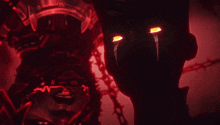 a close up of a person 's face with bright red eyes