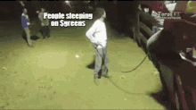 a man is tied to a horse with a rope and says people sleeping on sygreens .