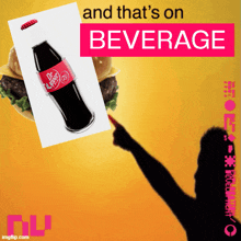 a bottle of dr pepper next to a hamburger