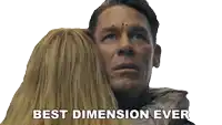 a man and a woman are hugging with the words best dimension ever behind them