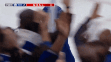 a hockey game is being played and the score is 2 to 0