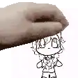 a hand is touching a drawing of a girl with glasses .