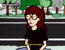a cartoon of a girl wearing glasses and a black shirt sitting on the side of a road .