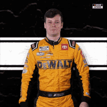 a man wearing a yellow racing suit that says dewalt on it