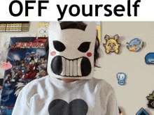 a person wearing a mask with the words off yourself on the top