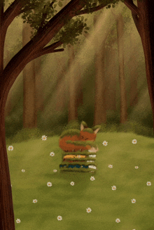 a fox laying on a pile of books in the grass