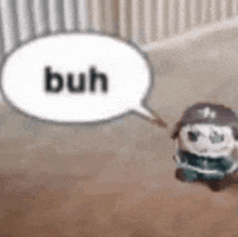 a stuffed animal is standing next to a speech bubble that says ` ` buh ` ` .