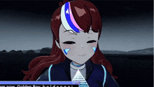 a computer screen shows a girl with red hair and a blue triangle on her forehead