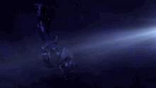 a dark blue background with a light coming from the bottom