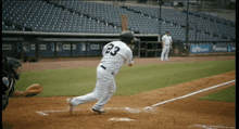 a baseball player with the number 23 on their jersey